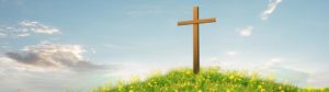 Picture of Cross on Hill with Yellow Flowers in Front