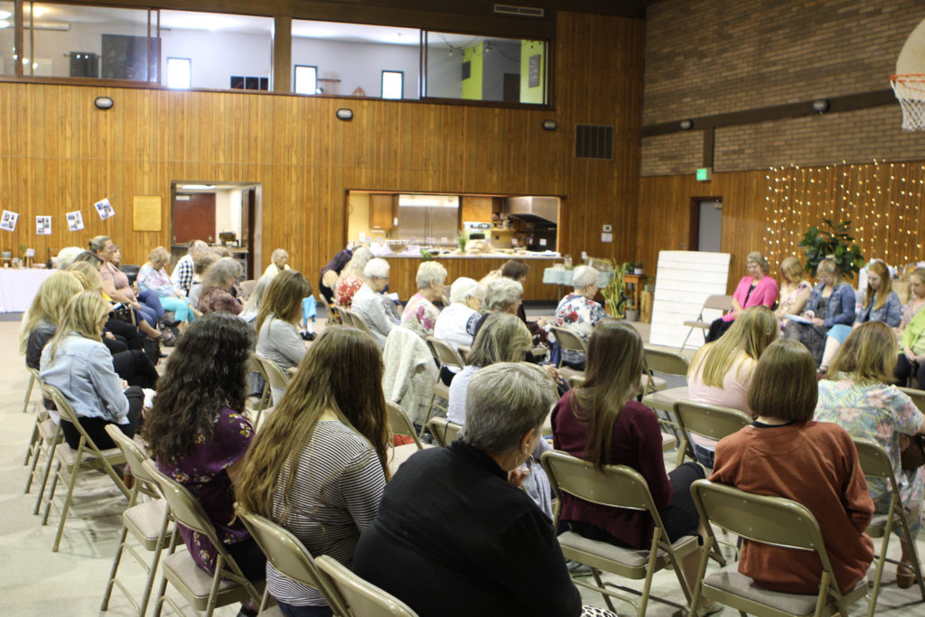 Ladies gather in the activity center for bridal shower