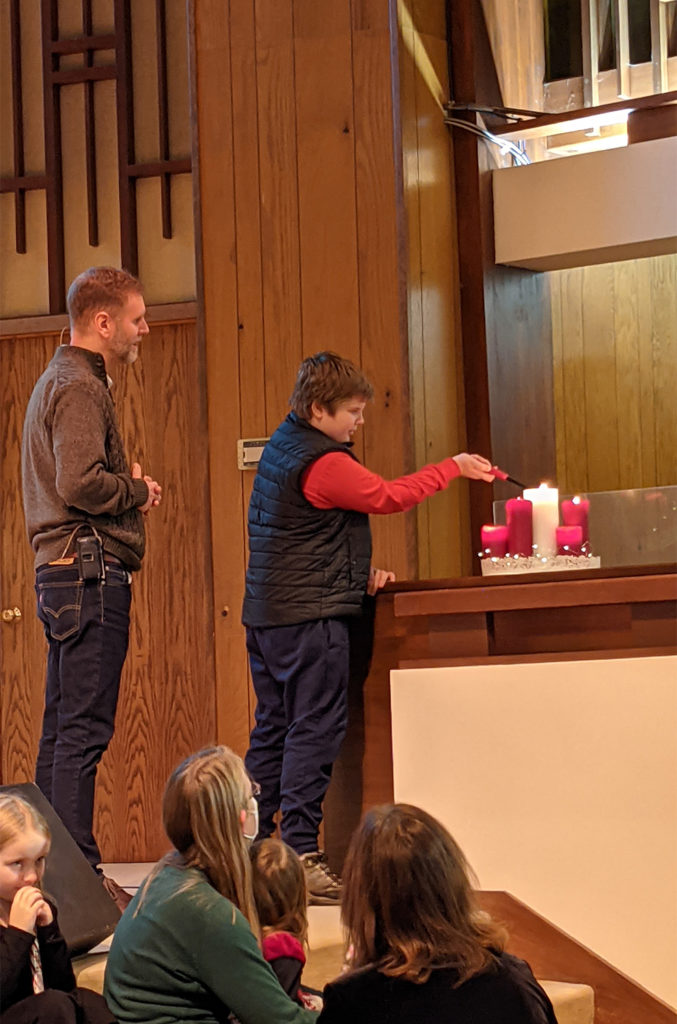 Lighting the 5th Advent Candle